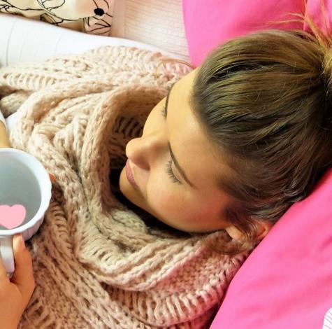 Young woman has a cold